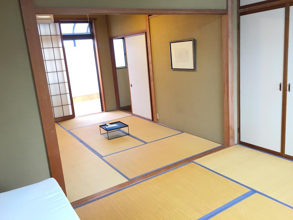 Toolate Guesthouse Toyama Bagian luar foto